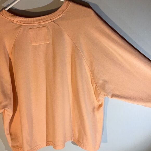 Friends Cropped Dolman Sleeve Central Perk Sweatshirt. Peach, Medium - Picture 5 of 9